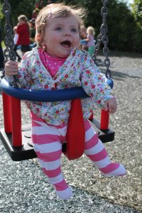 Toddler on a swing